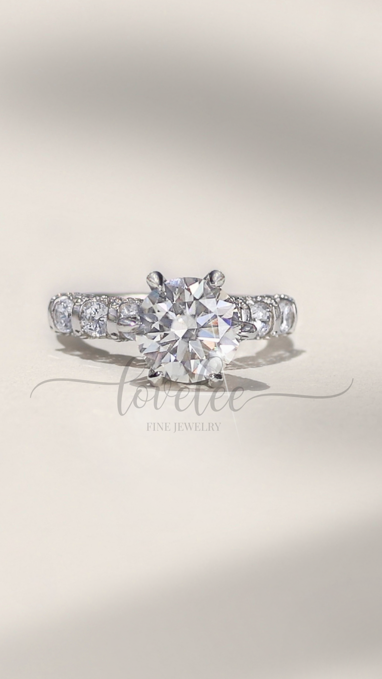 Chandler 3 CTW DEW Brilliant Cut Round Moissanite Ring with Accent Stones