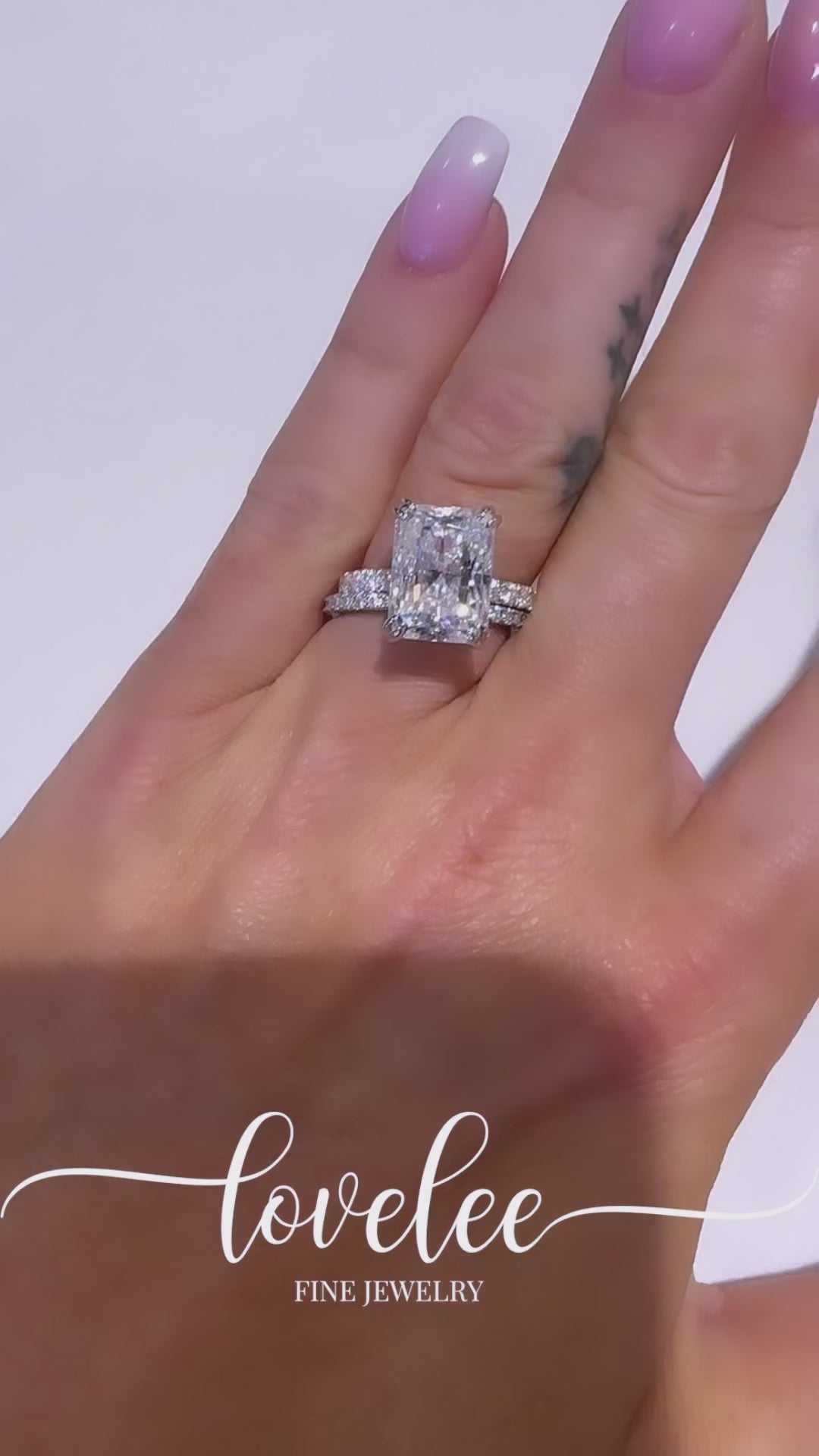 Becka 6+CT DEW Brilliant Cut Radiant Moissanite Ring with Hidden Halo on Pave Band