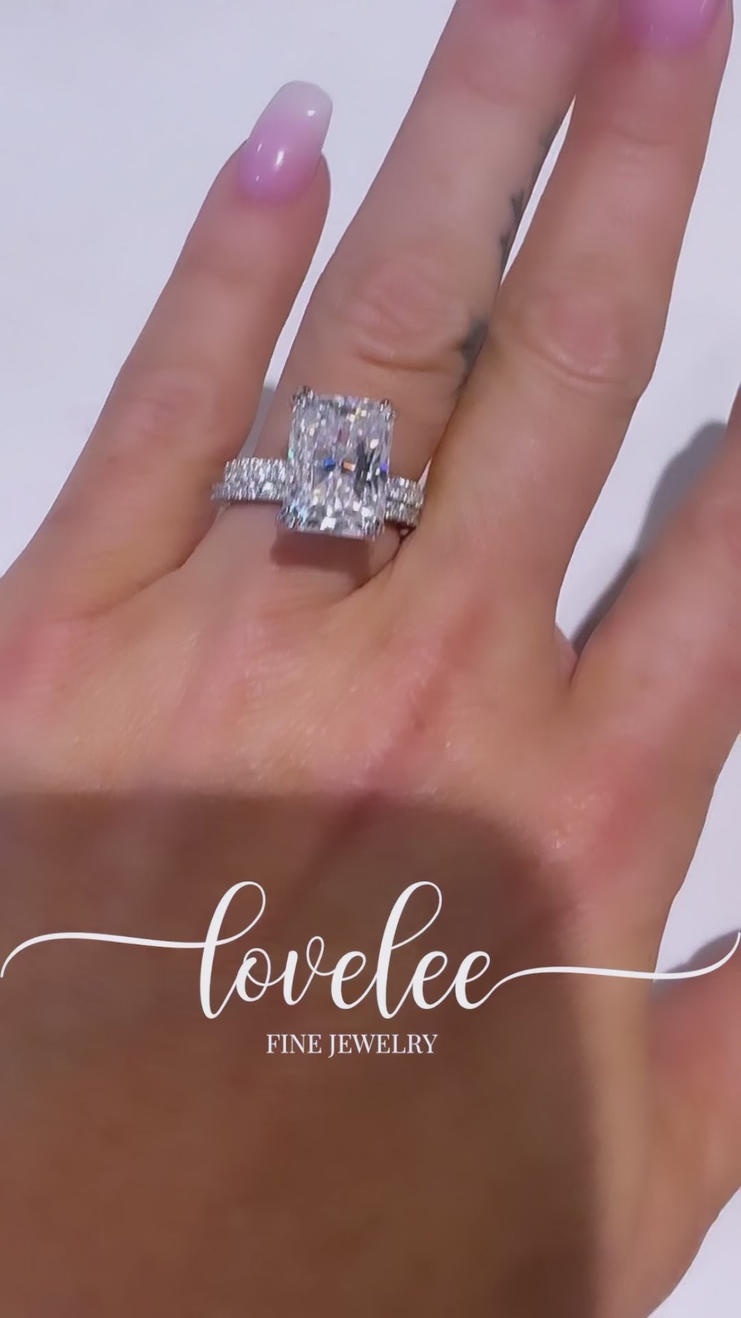 Becka 6+CT DEW Brilliant Cut Radiant Moissanite Ring with Hidden Halo on Pave Band