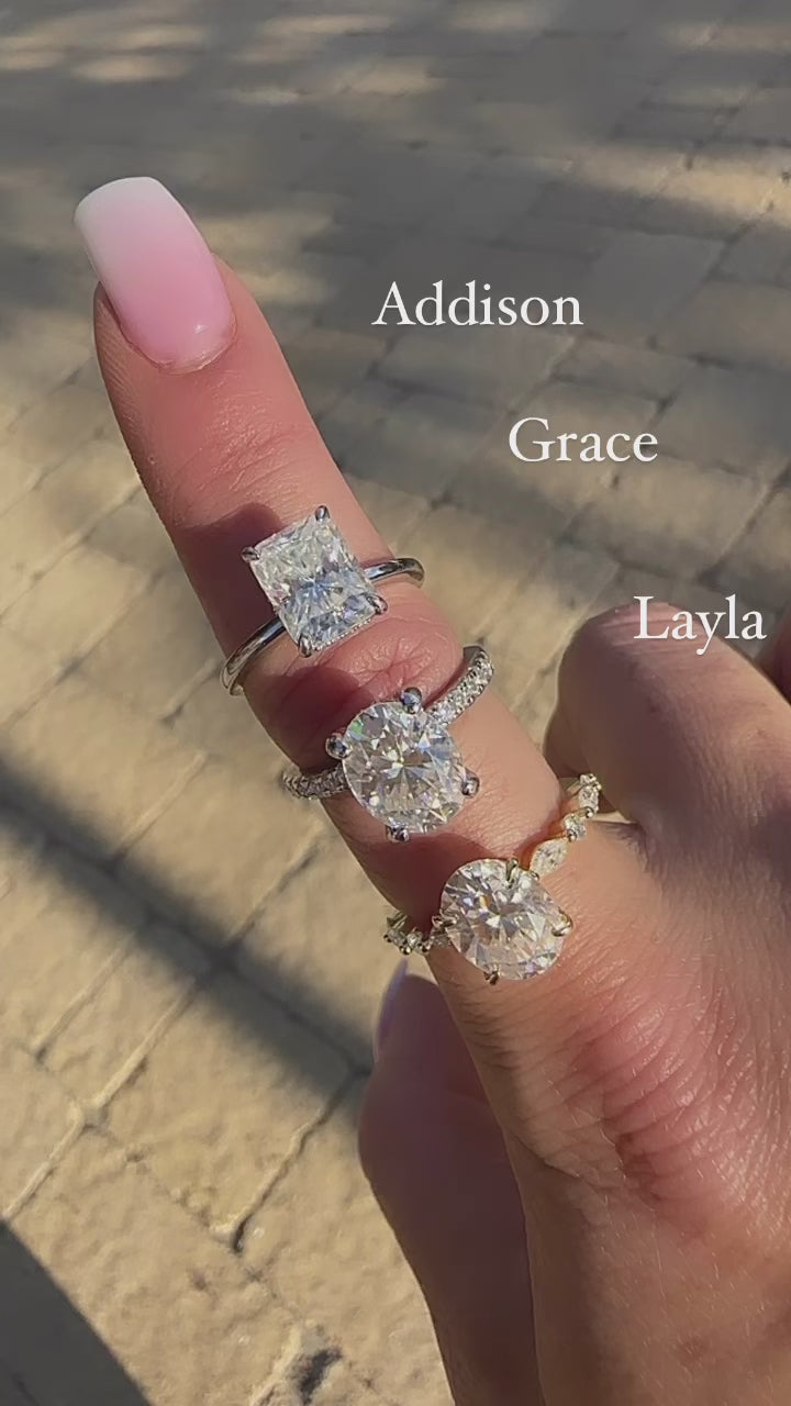 Layla 3 CTW DEW Brilliant Oval Moissanite Ring with Marquise & Round Side Stones