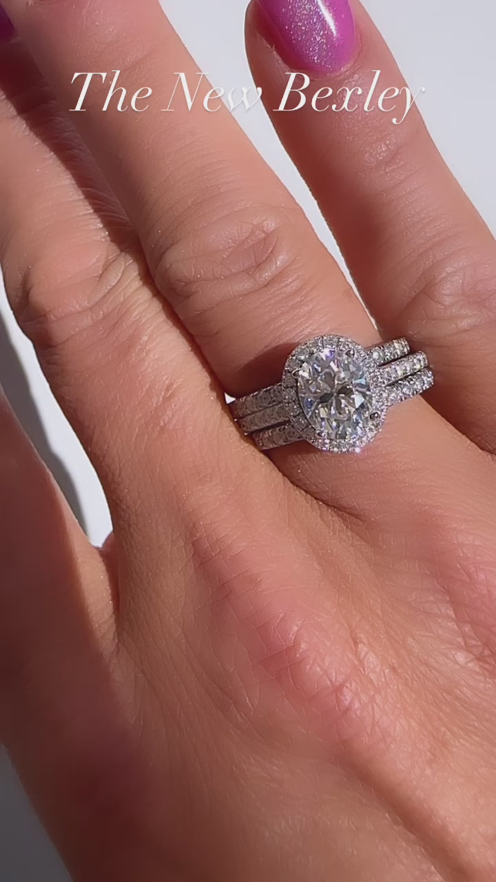 Bexley 1.5 ct. (8x6mm) Oval Moissanite Halo Engagement Ring with Side Stones