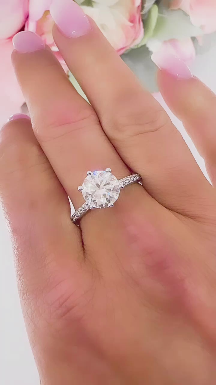 Hannah 2 CTW DEW Brilliant Cut Round Moissanite Ring with Accent Stones