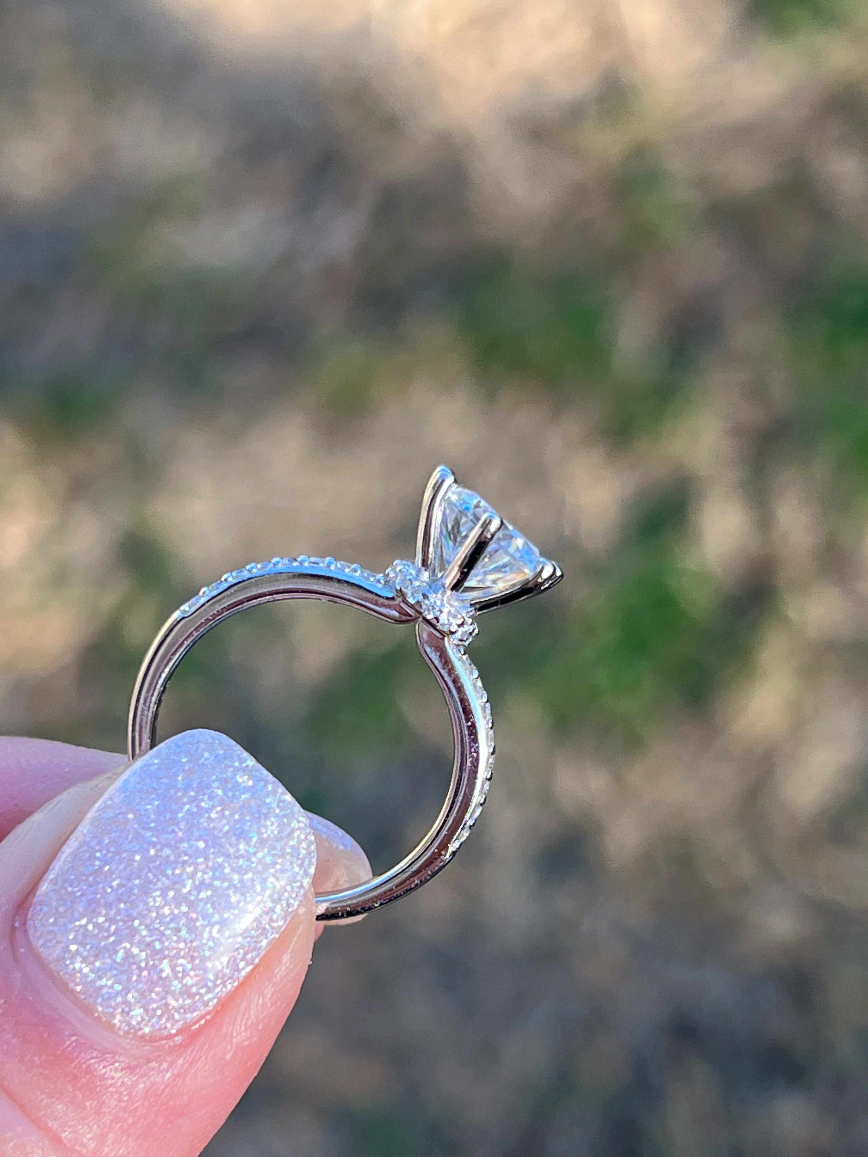 Hannah 2 CTW DEW Brilliant Cut Round Moissanite Ring with Accent Stones