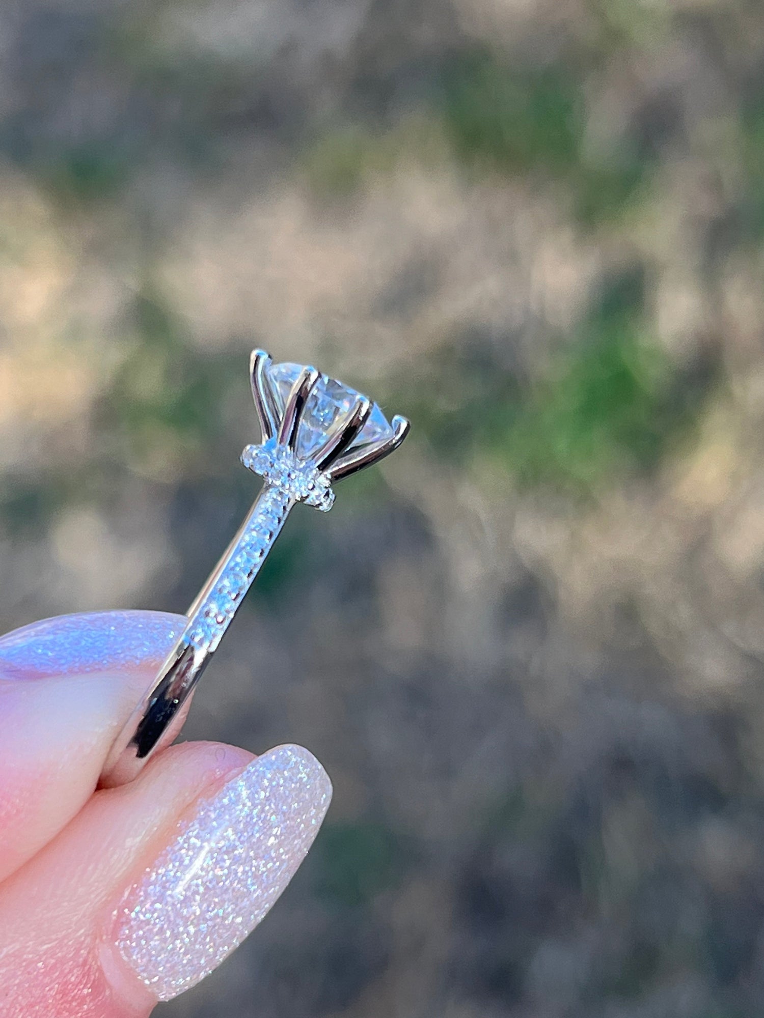 Hannah 2 CTW DEW Brilliant Cut Round Moissanite Ring with Accent Stones