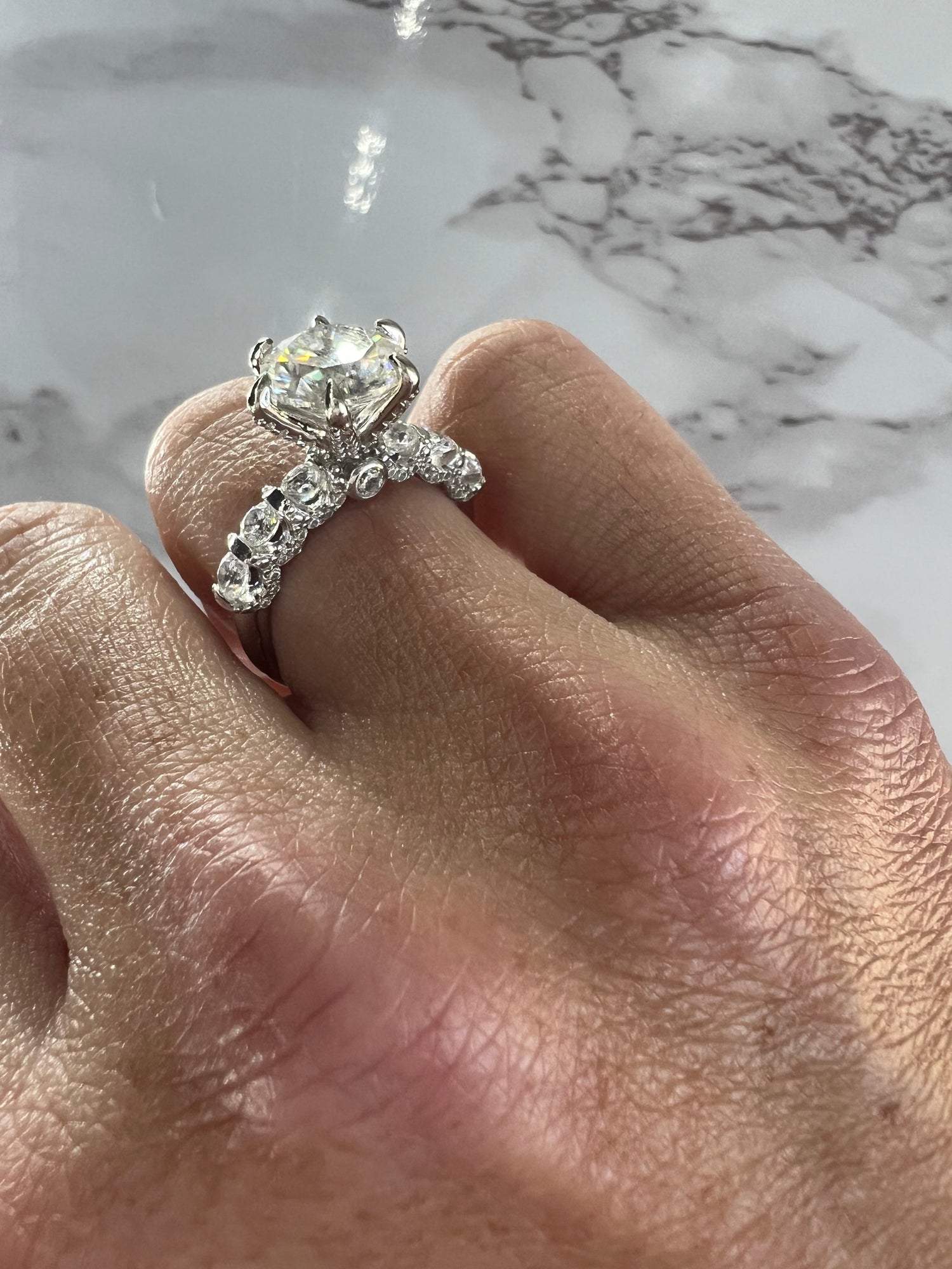 Chandler 3 CTW DEW Brilliant Cut Round Moissanite Ring with Accent Stones