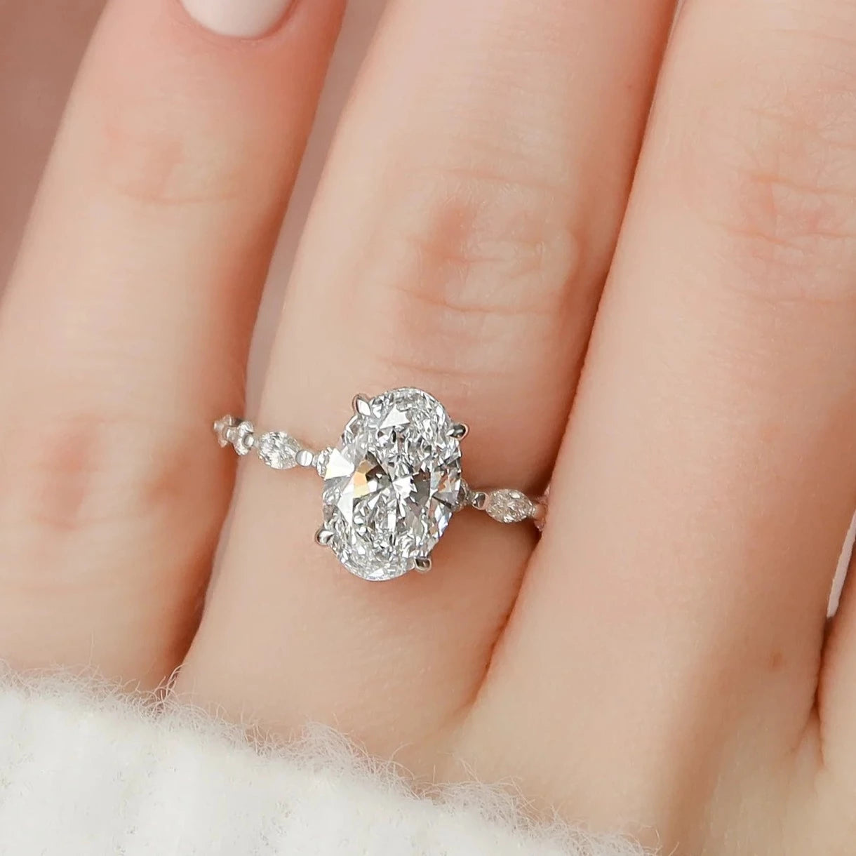 Layla 3 CTW DEW Brilliant Oval Moissanite Ring with Marquise