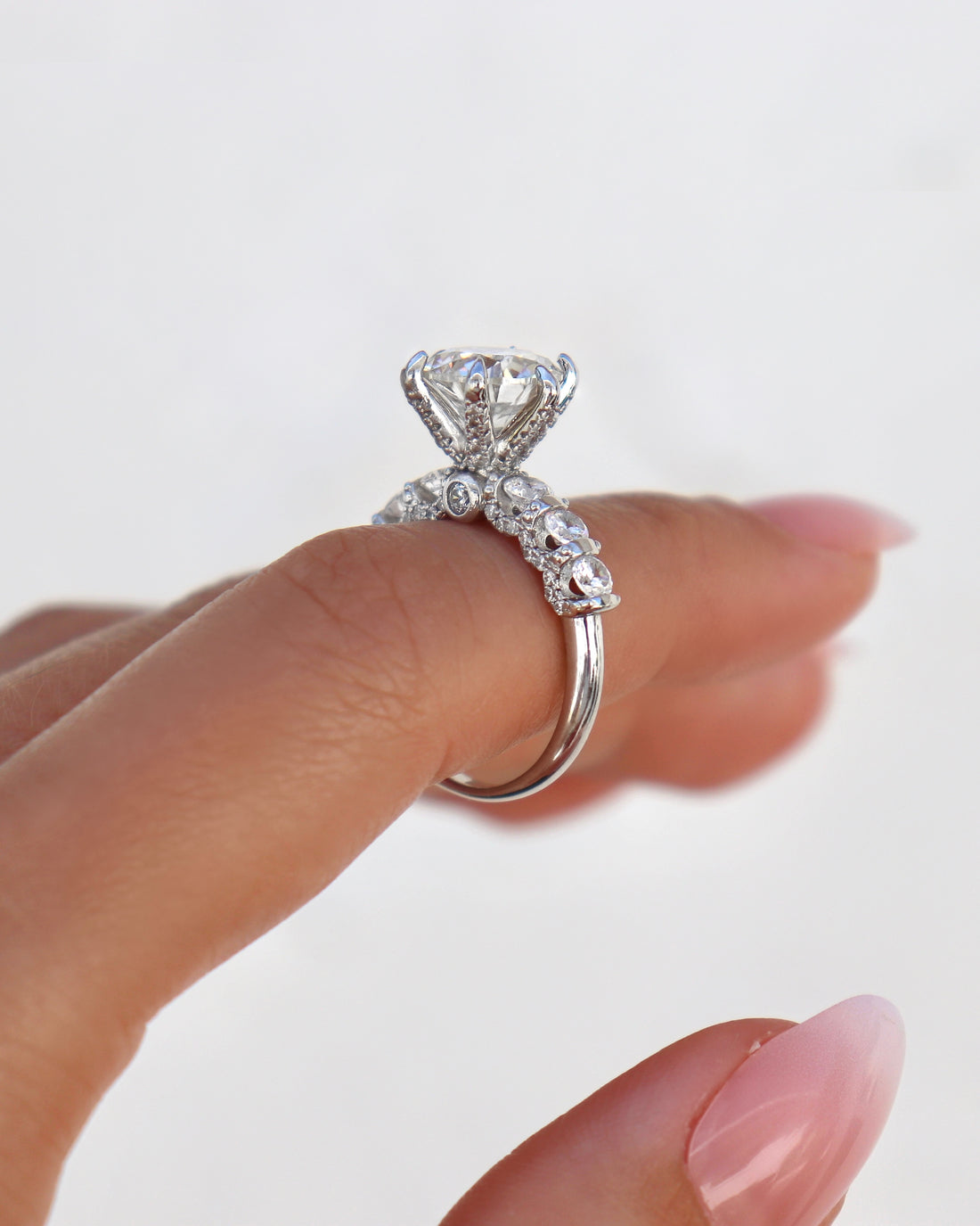 Chandler 3 CTW DEW Brilliant Cut Round Moissanite Ring with Accent Stones