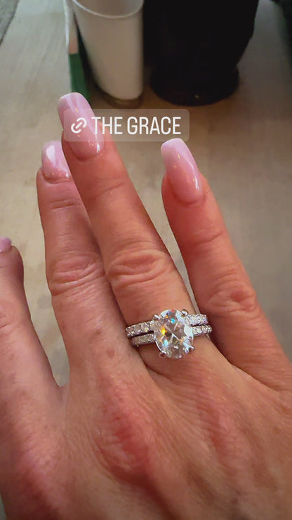 Grace 3.5 CTW DEW Brilliant Oval Moissanite Engagement Ring with Moissanite Pave Halo, Prongs &amp; Band